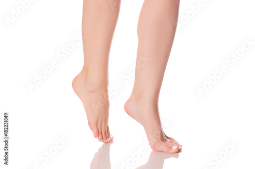 Female feet heels on toes isolated