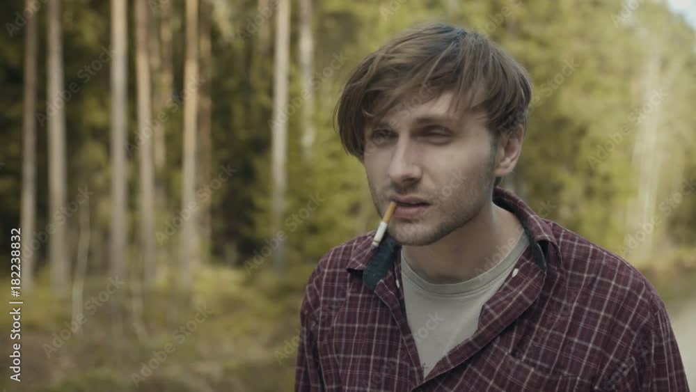 Shocked man with a cigarette in his mouth