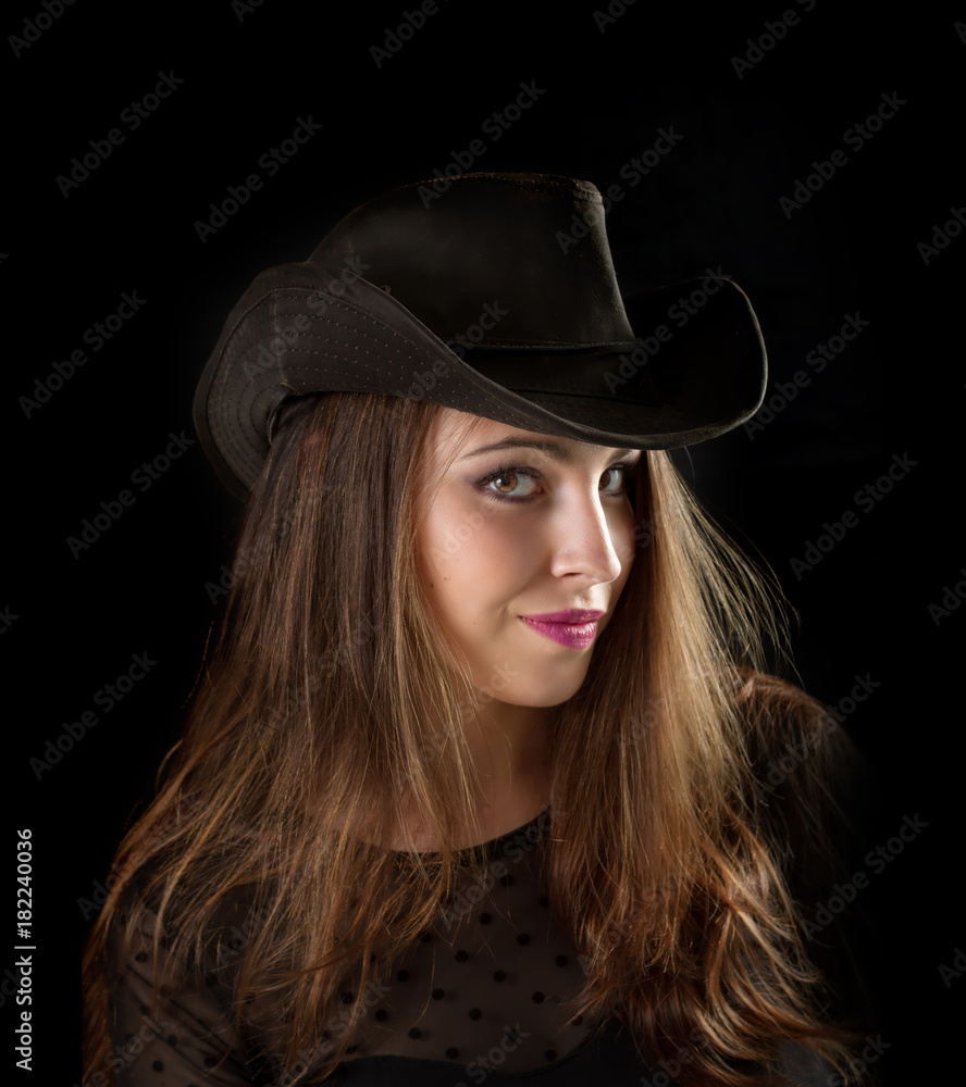 Portrait of a smiling woman on black background. Portrait of a smiling woman on black background.