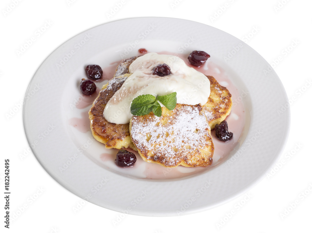 Pancakes with sour cream and cherries. Pancakes with sour cream and cherries.