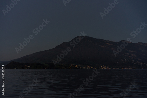 sunset on lake lucerne viewed from boat clear sky