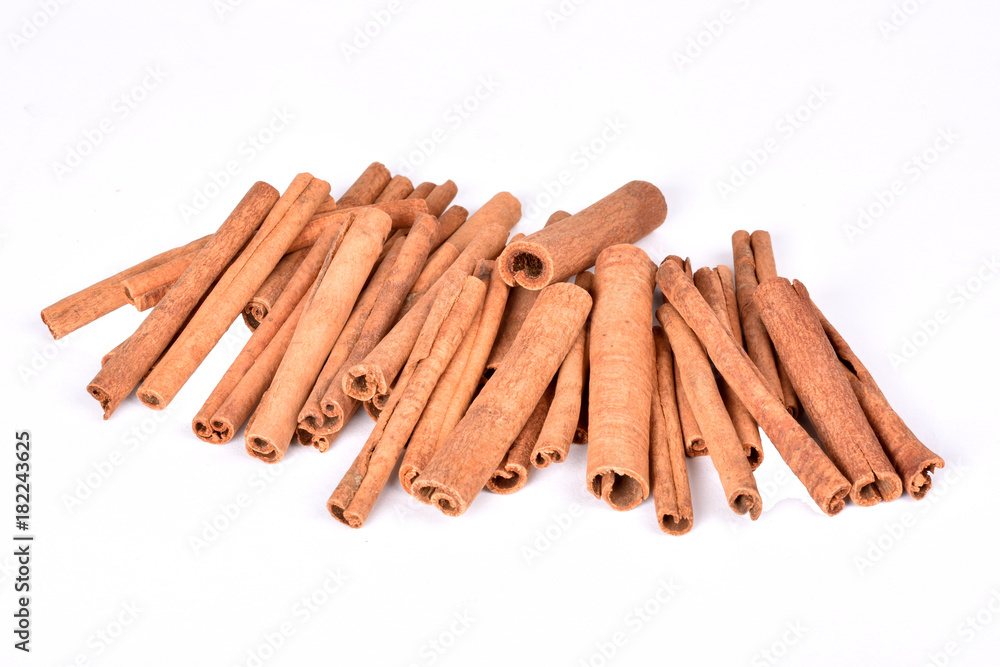 Isolated cinnamon on white background.Cinnamon sticks.Spices for coffee. Isolated cinnamon on white background.Cinnamon sticks.Spices for coffee.