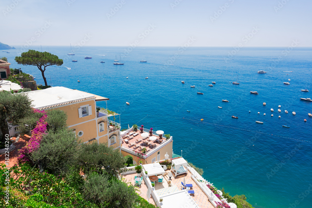 Rocky coast and Tyrrhenian Sea waters near Positano, Amalfi coast Italy