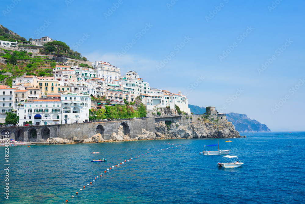 Amalfi town and Tyrrhenian sea waters at summer, Italy