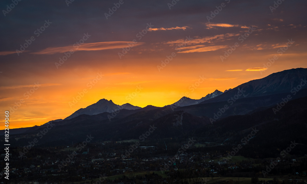 Dawn over peak Havran and Zakopane in Tatra mountains from Koscielisko, Poland