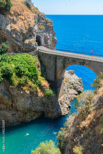 famous picturesque viaduct and winding road over sea of Amalfi coast, Italy