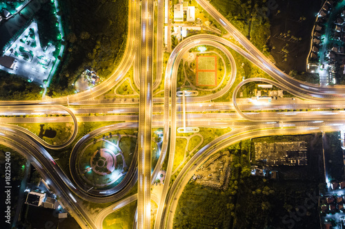 Aerial view light intersection on motorway highway at night © themorningglory