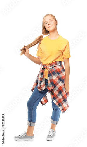 Cute teenager girl on white...