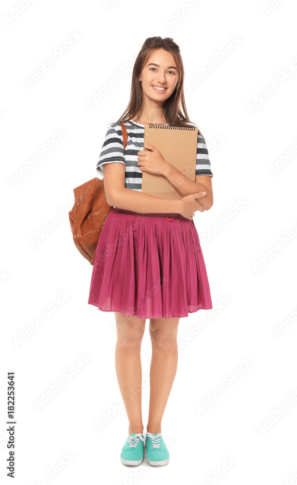 Cute teenager girl with notebook and backpack on white background Cute teenager girl with notebook and backpack on white background