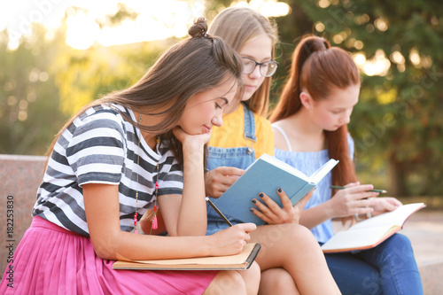 Cute teenagers spending time outdoors