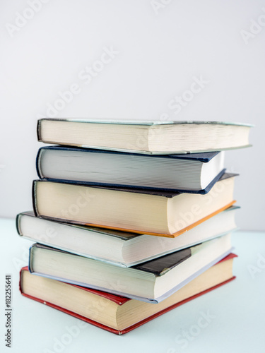 Education concept - books on the gray background 