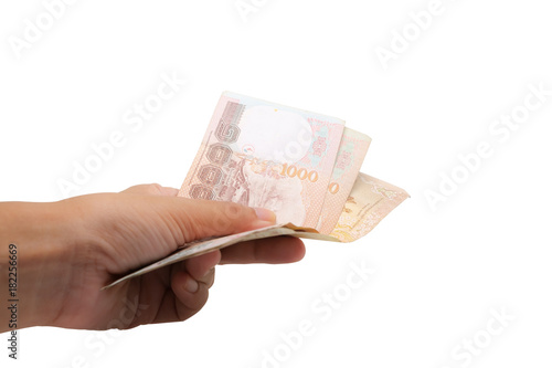 Hand holding Thai currency,...