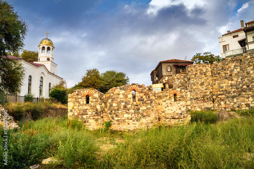 City landscape - Orthodox church and ancient ruins in the town of Sozopol on the Black Sea coast in Bulgaria