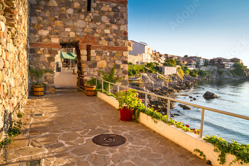 Seaside landscape - fortress wall and tower in the city of Sozopol on the Black Sea coast in Bulgaria
