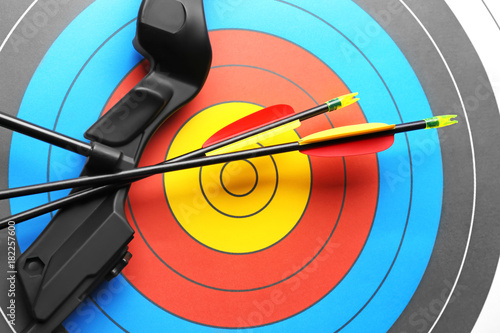 Photos Target with bow and arrows for archery, closeup