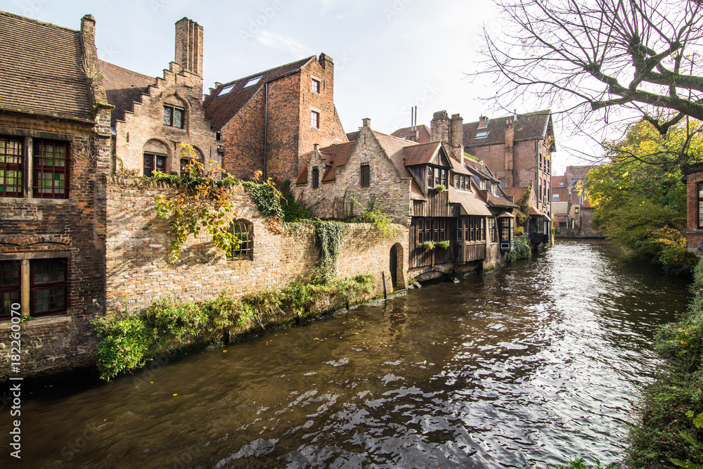 Brugge, Belgium - November, 2017. Brugge medieval historic city. Brugge streets and historic center. canals and buildings. Brugge popular touristic destination of Belgium. Brugge, Belgium - November, 2017. Brugge medieval historic city. Brugge streets and historic center. canals and buildings. Brugge popular touristic destination of Belgium.