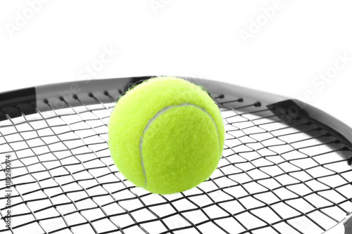 Tennis racket and ball on white background, closeup © Africa Studio