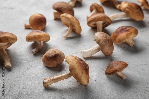 Raw shiitake mushrooms on table