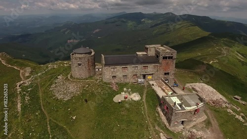 old abandoned observatory on mount Pip Ivan in Carpathian mountains, Ukraine photo