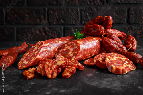 Variety of dry cured Spanish pork chorizo sausages made with paprika and garlic