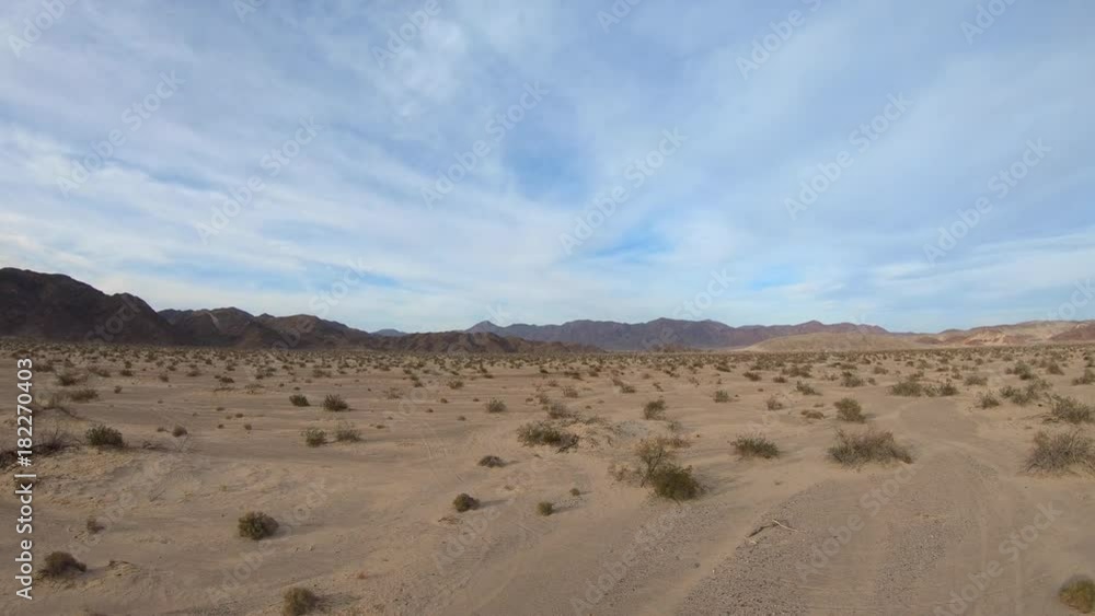 Aerial view of empty Mojave desert landscape between Barstow and Baker in Southern California. Aerial view of empty Mojave desert landscape between Barstow and Baker in Southern California.