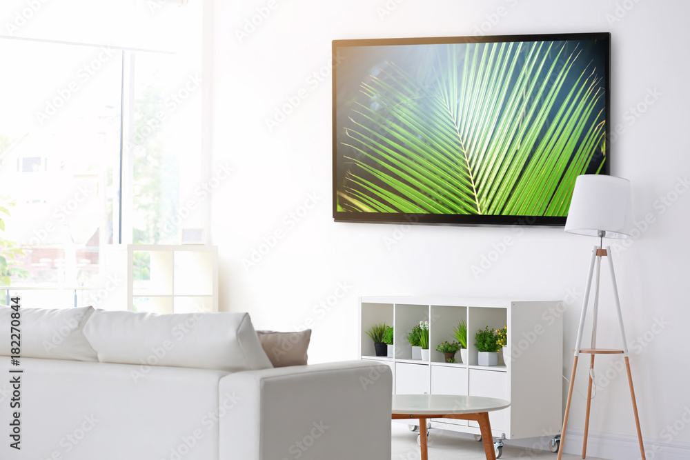Fototapeta premium Stand for TV set in modern white living room