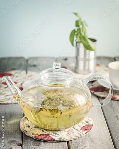 Glass teapot with herbal tea