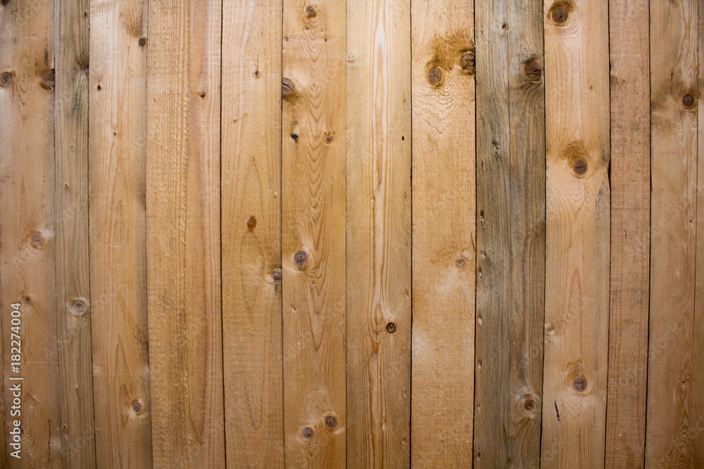 Wood texture background, wooden panels close up. Grunge textured image. Vertical stripes Wood texture background, wooden panels close up. Grunge textured image. Vertical stripes