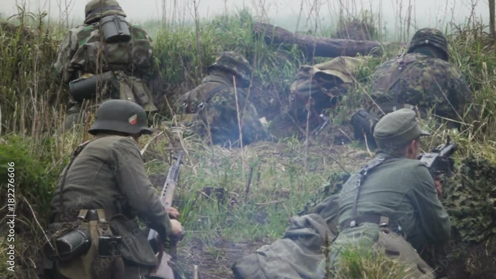 Historical reconstruction of Second World War. Soldiers on battle field during assault on Fort 5 in Koenigsberg. hostilities of Second World war. Slow Motion. Kaliningrad - May 2017 Russian Historical reconstruction of Second World War. Soldiers on battle field during assault on Fort 5 in Koenigsberg. hostilities of Second World war. Slow Motion. Kaliningrad - May 2017 Russian