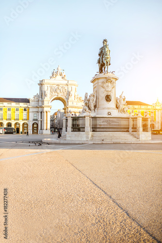 Morning view on the Commerce square with statue fo king Joseph and Triumphal arch in Lisbon city, Portugal