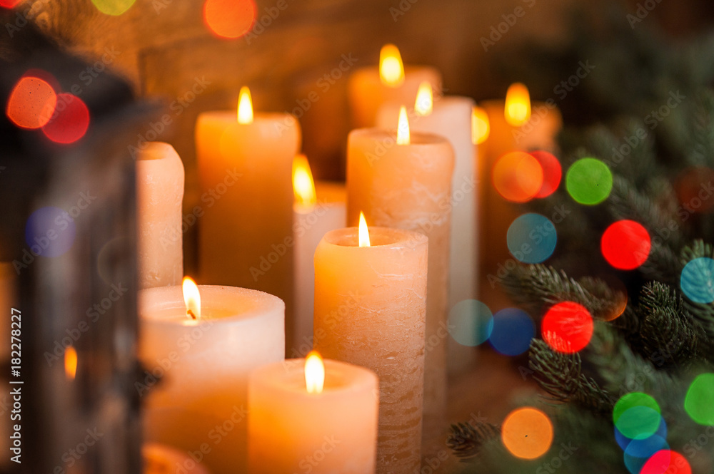 Christmas candles and lights on the eve of the New Year or Christmas, Christmas card