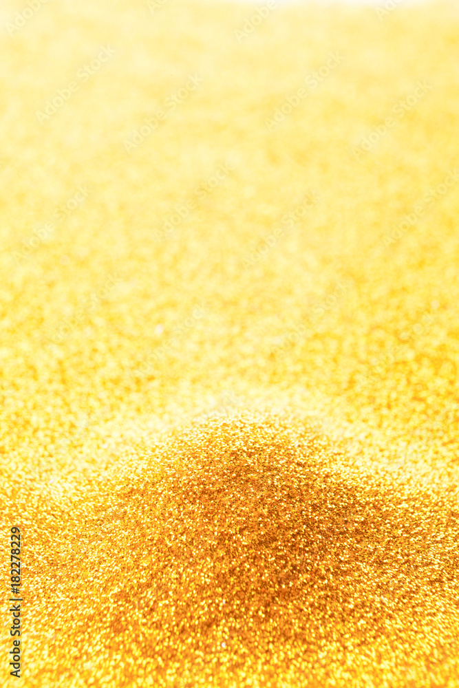 Golden glitter pile, bright luxury background