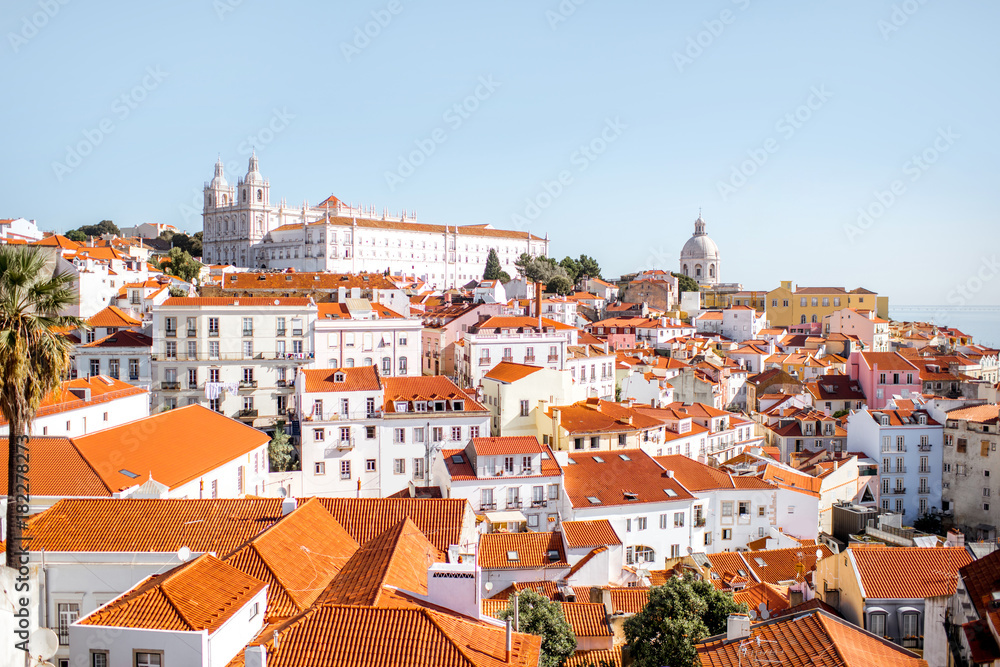 Cityscape view on the old town in Alfama district during the sunny day in Lisbon city, Portugal
