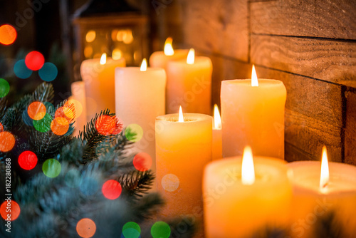 Christmas candles and lights on the eve of the New Year or Christmas  Christmas card
