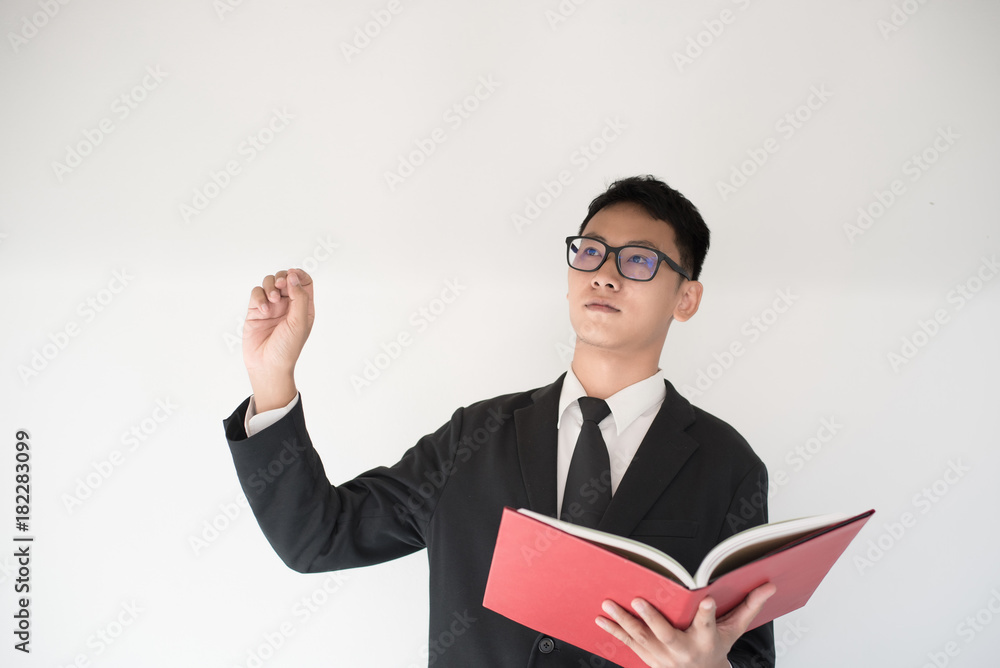 Beautiful business man reading a book with idea Beautiful business man reading a book with idea