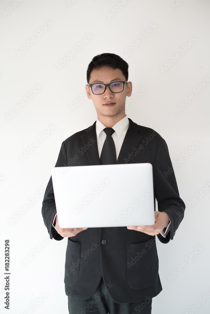 Asian Businessman use of notebook Asian Businessman use of notebook