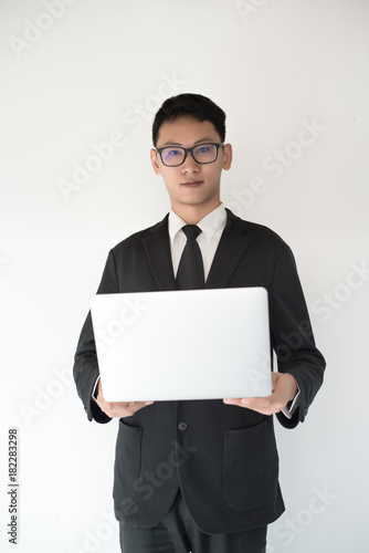 Asian Businessman use of notebook