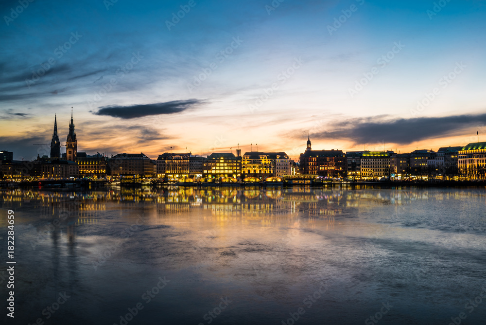 Hamburg cityscape with Alster Lake at sunset panorama