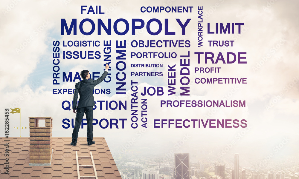 Young businessman standing on house roof and writing leadership Young businessman standing on house roof and writing leadership