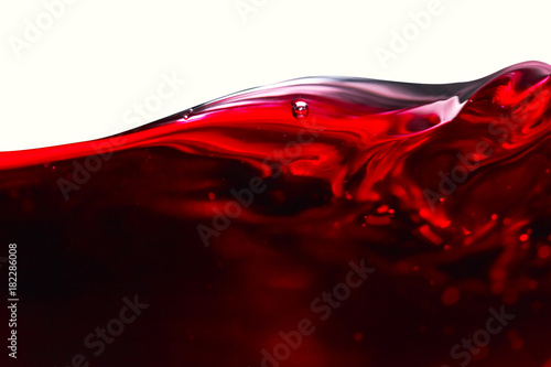 Red wine on white background