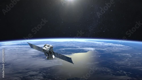 Satellite. The satellite flies to the right. The earth slowly rotates to the right. 4K.