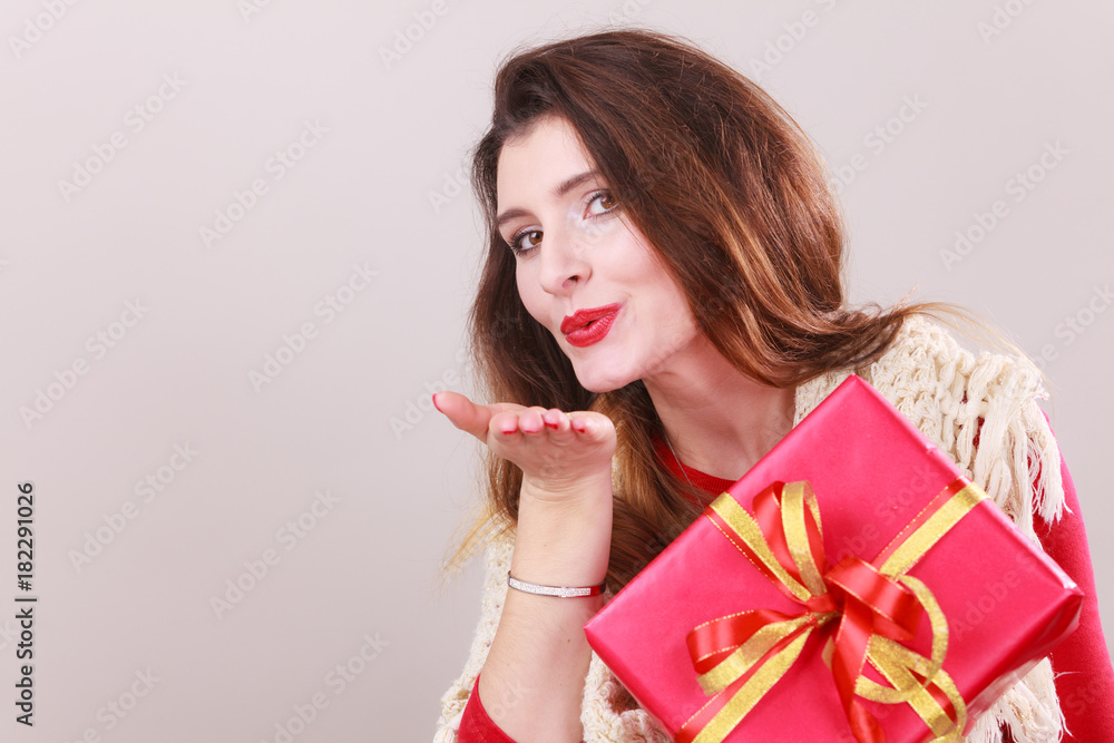 Woman with red christmas gift box Woman with red christmas gift box