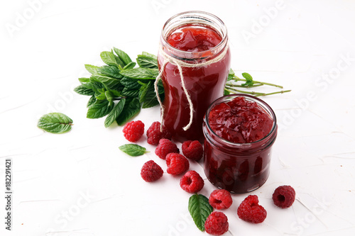 Fresh raspberry jam with toast or bread for breakfast photo