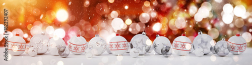 White and red christmas baubles lined up 3D rendering