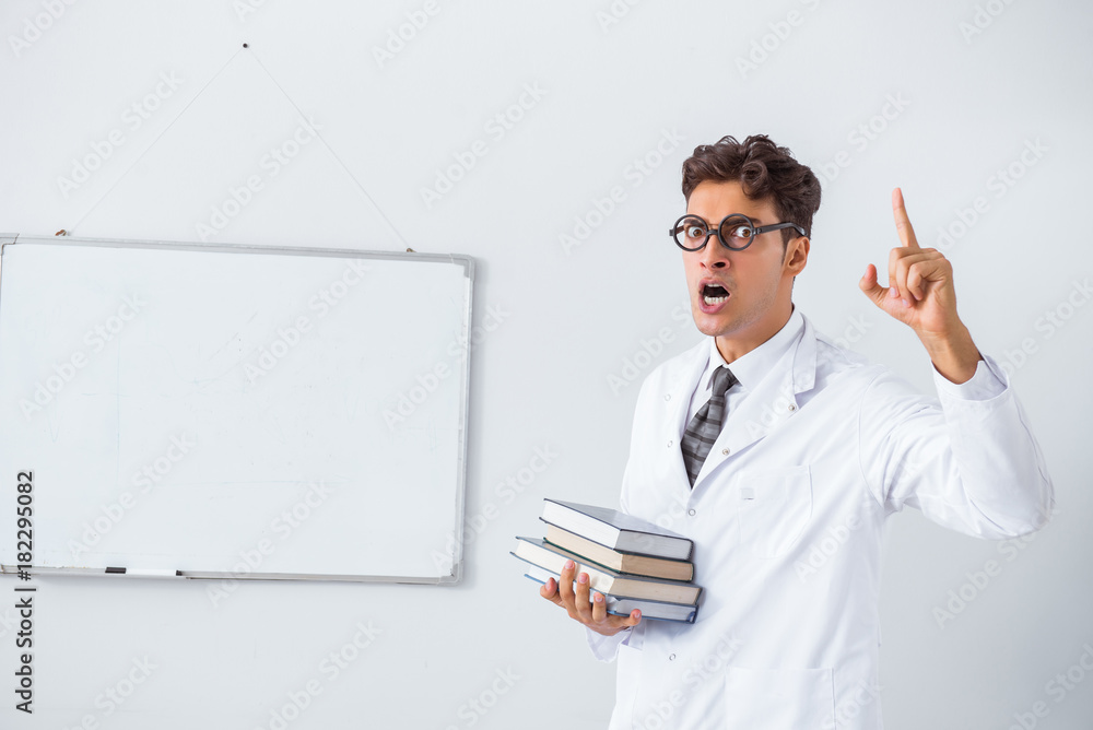 Funny doctor scientist making presentation in hospital Funny doctor scientist making presentation in hospital