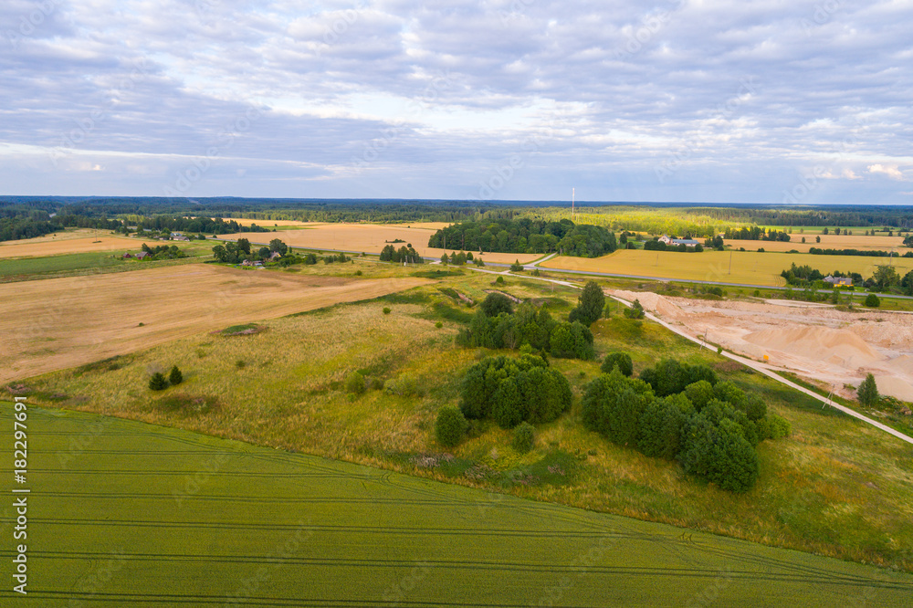 Aerial view of amazing summer landscape. Fields and meadows from above.