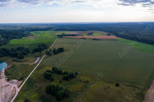 Aerial view of amazing summer landscape. Fields and meadows from above.
