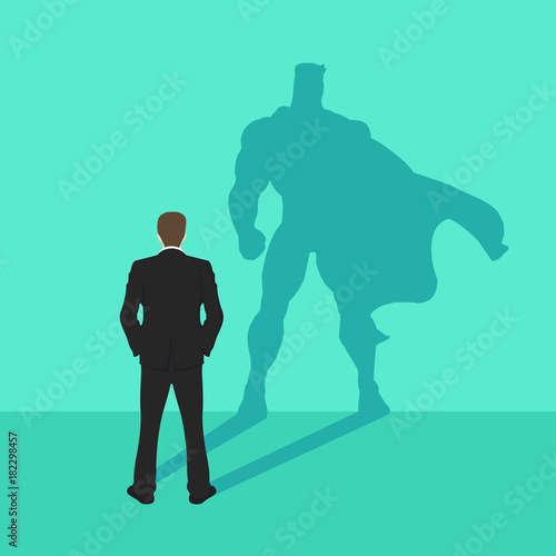 illustration of a confident handsome business man standing with his arms folded with superhero shadow