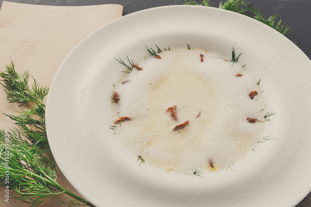 Delicious cream soup with honey fungus close up Delicious cream soup with honey fungus close up