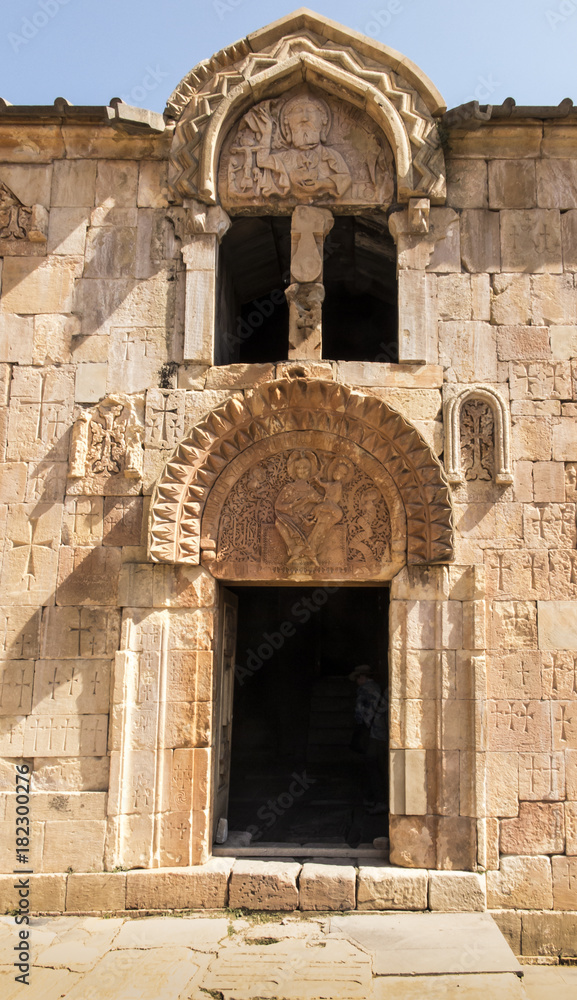 Armenia, the monastery of Noravank. The central entrance to the church of John the Baptist with a unique bas-relief depicting God the Father.